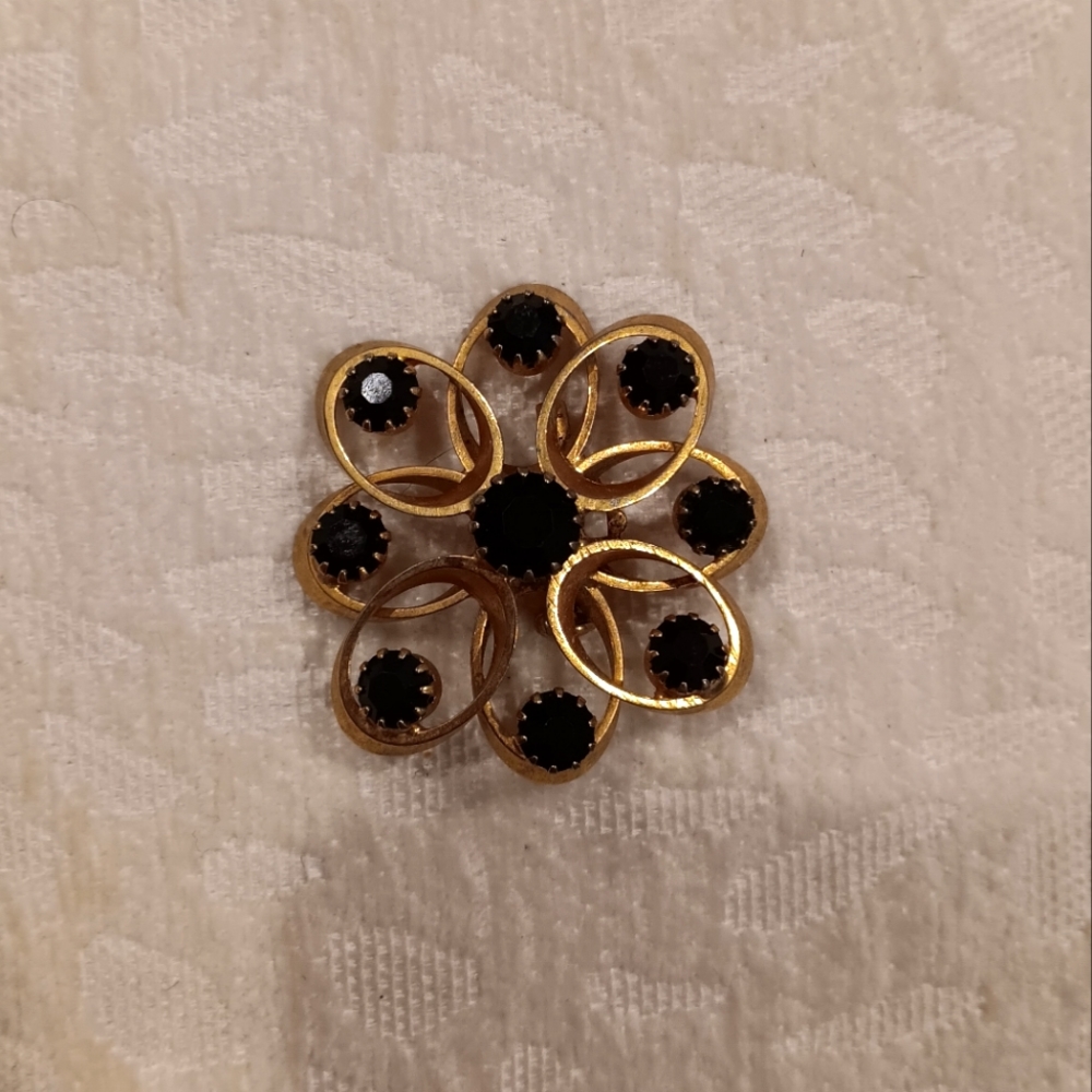 Vintage black and gold brooch